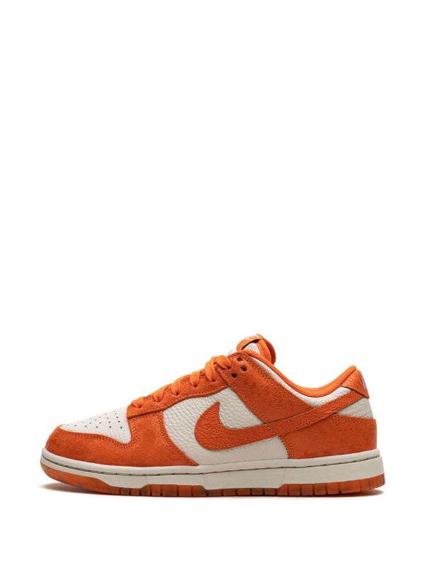 orange and white nikes