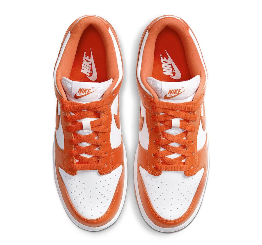 orange and white dunks