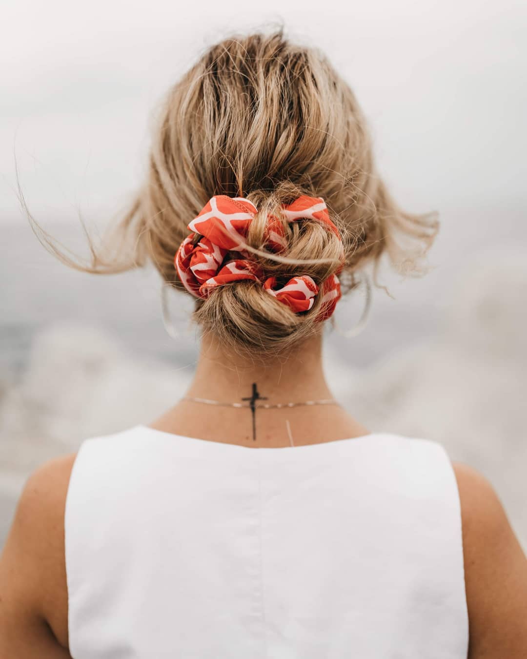 Hair bun with accessories for different occasions. How to dress up or down your bun with the right add-ons.