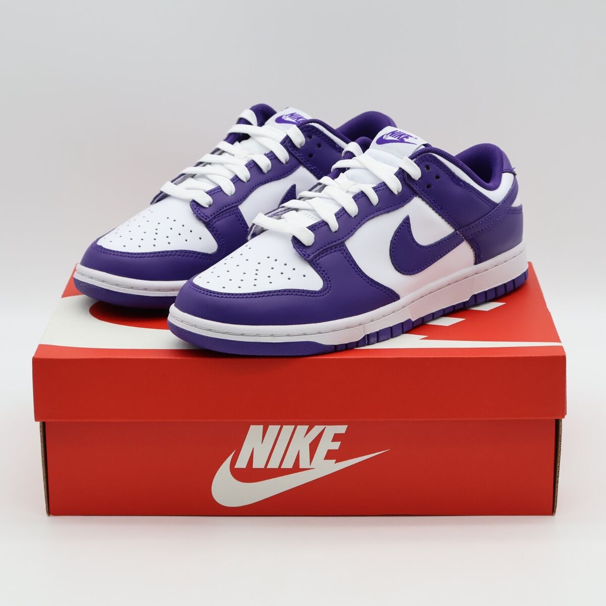 purple and white dunks