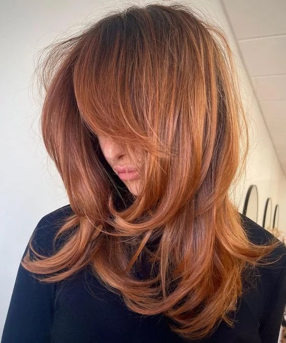 Ginger hair with red highlights: Is it right for you? Consider these factors before taking the plunge.