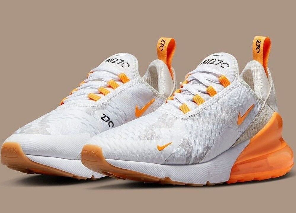 orange and white nike shoes