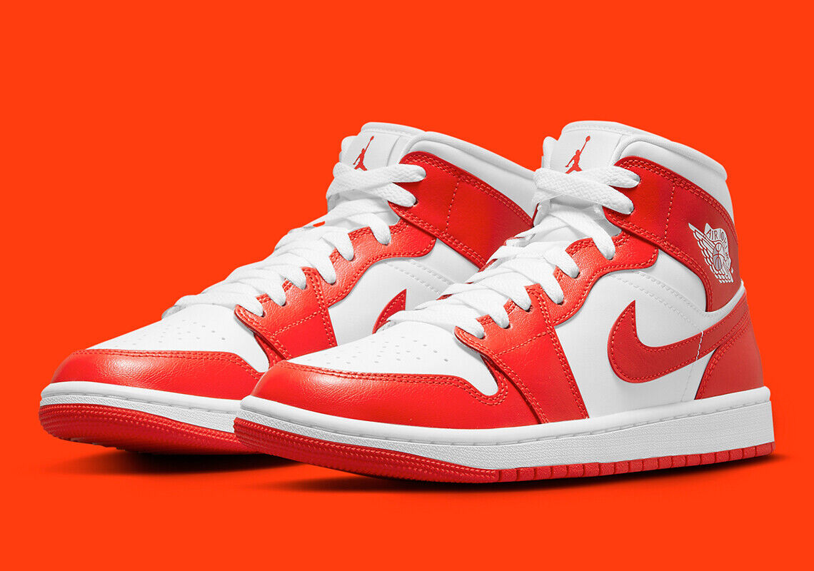 white and orange jordans
