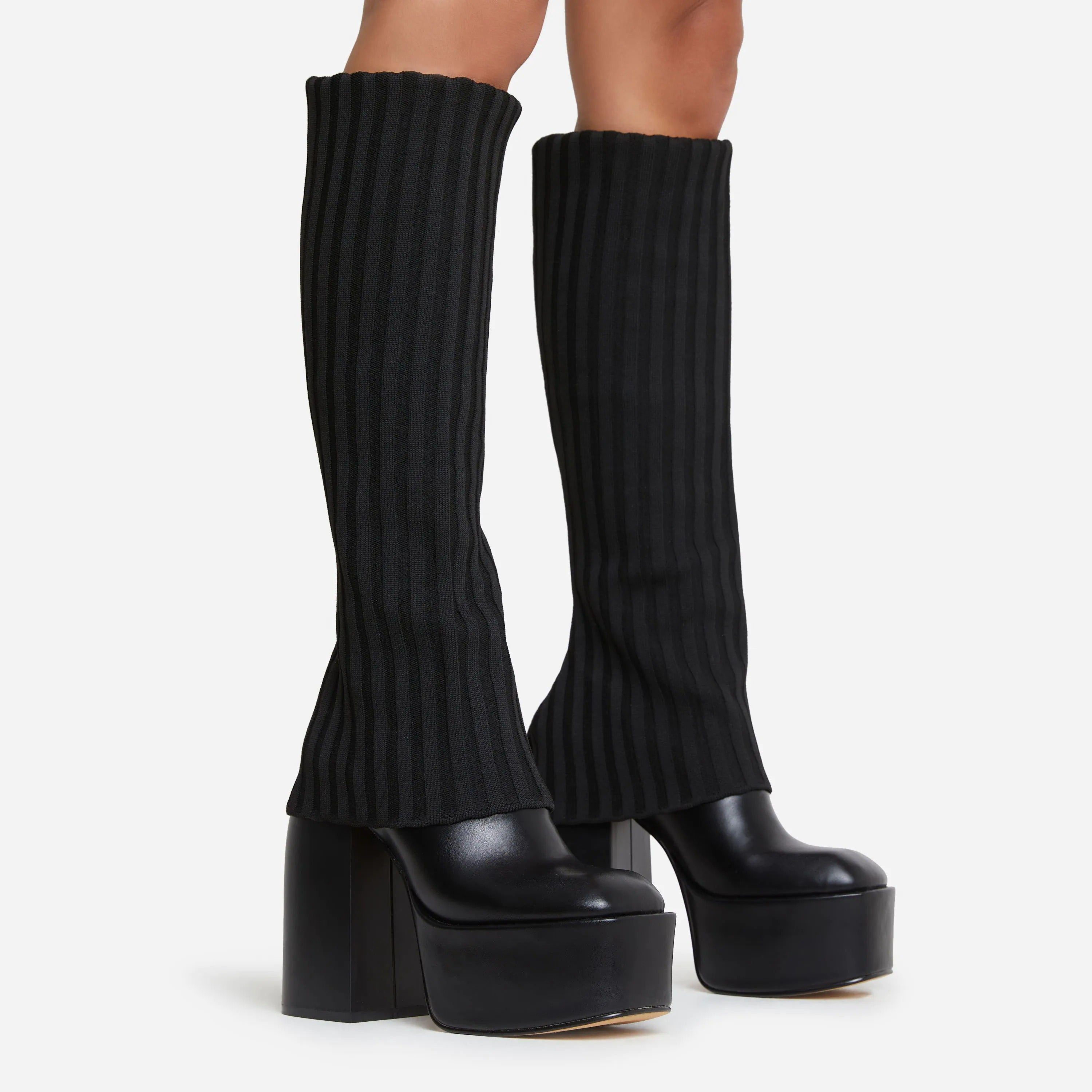 Why Every Woman Needs Tall Platform All Black Boots in Her Wardrobe Right Now?