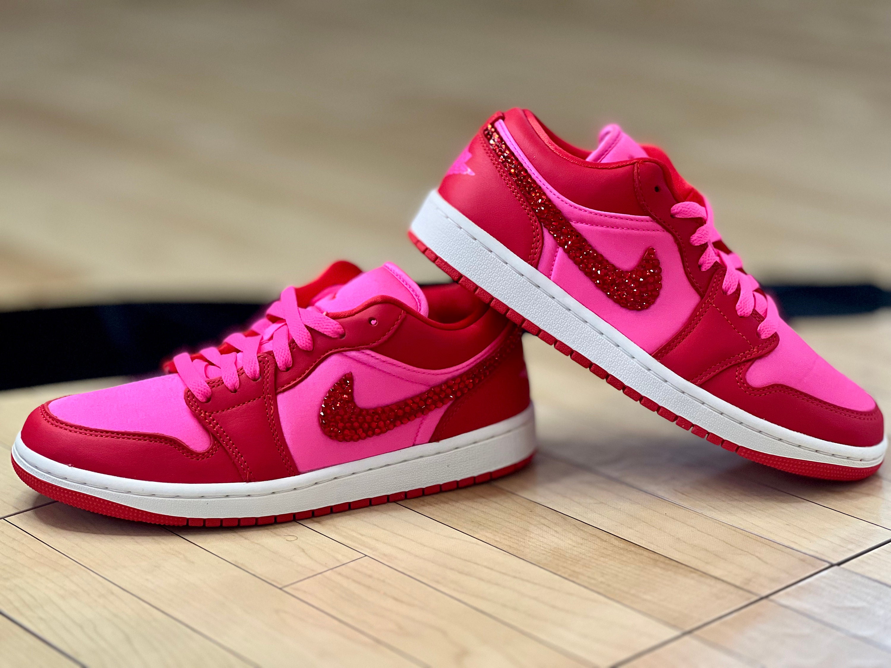 pink and red jordans